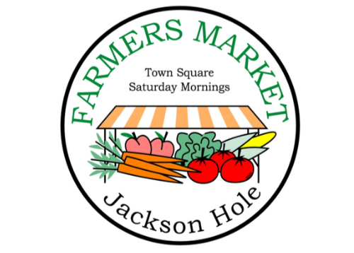 Logo of Jackson Hole Farmers Market with a market stand and vegetables on a white background